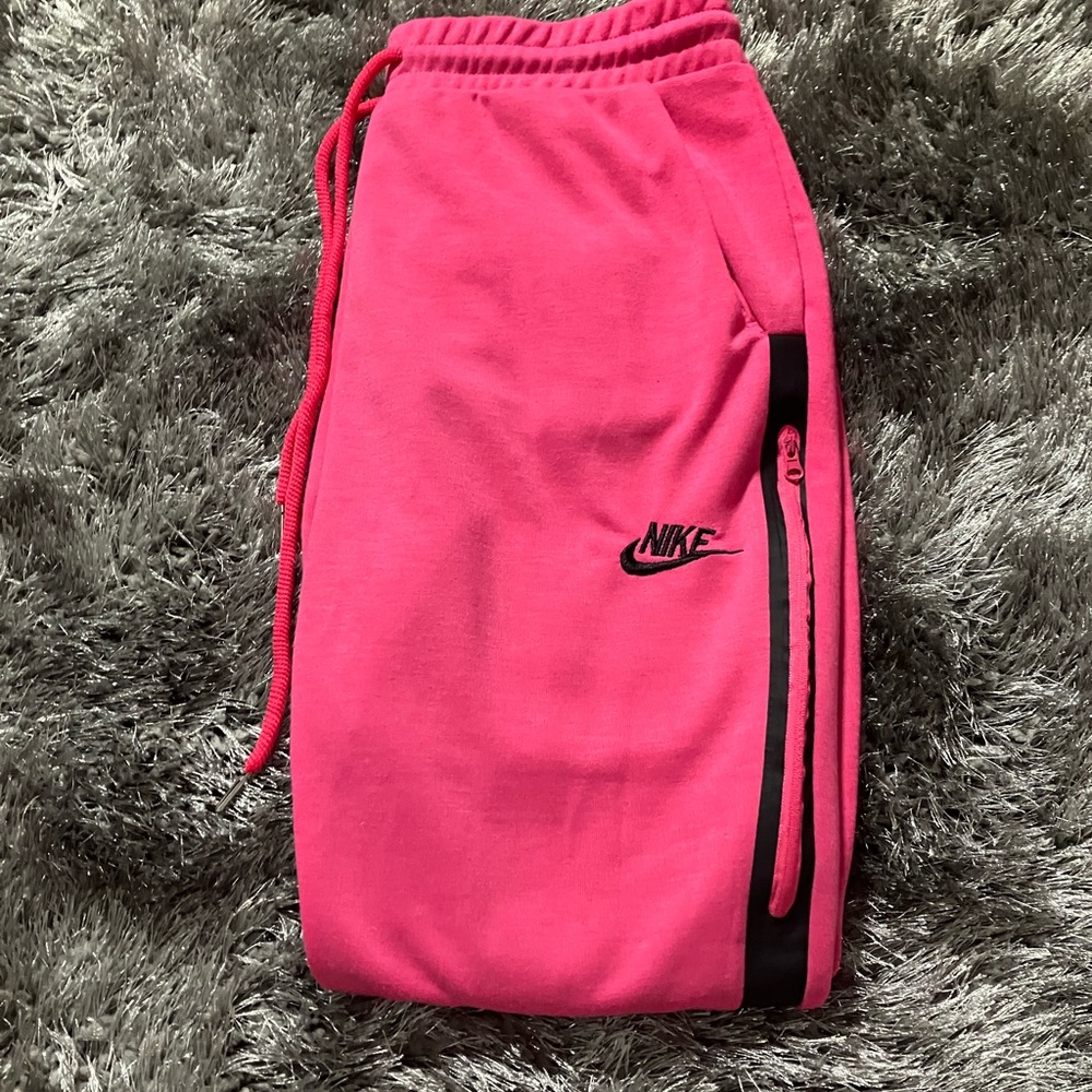 Pink Nike joggers (S)